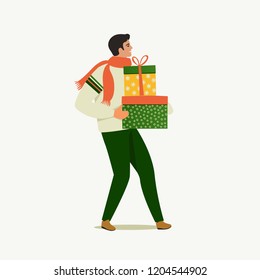 Person Carrying a Christmas boxes. Merry Christmas and Happy New Year. People are preparing for the new year.