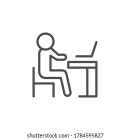 Person at computer desk icon