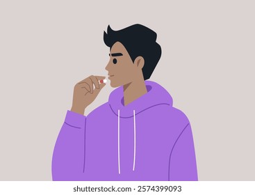 A person in a cozy purple hoodie thoughtfully prepares to take a pill, embracing a moment of self-care and reflection on health and well-being