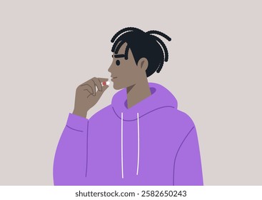 A person in a cozy purple hoodie thoughtfully prepares to take a pill, embracing a moment of self-care and reflection on health and well-being