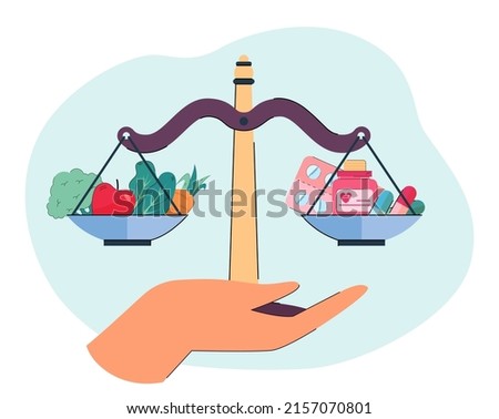Person deciding between natural and artificial vitamins. Hand holding scale with vegetables and fruits and pills on it. Health, decision concept for banner, website design or landing web page