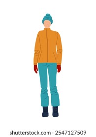 Una persona vestida para el Clima frío con chaqueta naranja, pantalones azules y accesorios de invierno