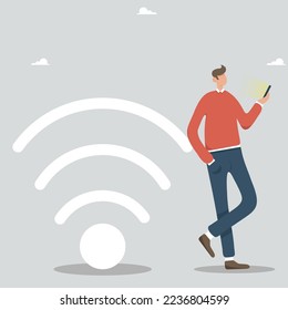A person in the free internet zone is working on a phone, next to a large Wi-Fi sign. Free wi-fi hotspot, wi-fi bar, public evaluation area, portable device concept.