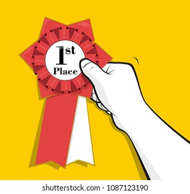 Person hand putting the winner ribbon