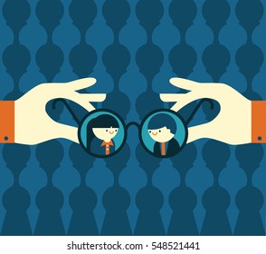 A person hold a pair of glasses that are focusing on a businessman and a businesswoman