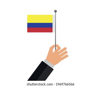 Person holding the flag of Colombia. Colombian flag icon.
