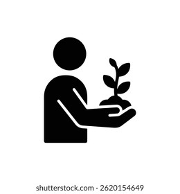 Person Holding Small Plant Representing Care and Personal Growth