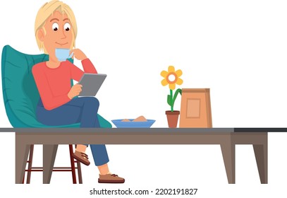 Person looking on tablet and drinking coffee. Home lazy rest