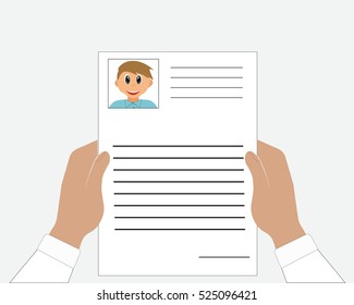 Person looking through CV