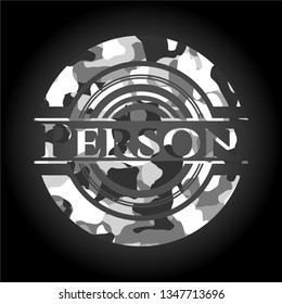 Person on grey camouflaged pattern
