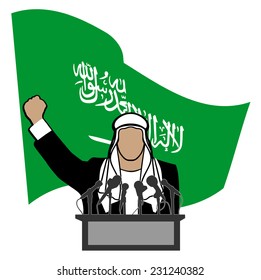 person on a tribune against a flag of Saudi Arabia