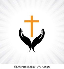 Person praying with cross in hand - concept of a devout christian worshiping Christ