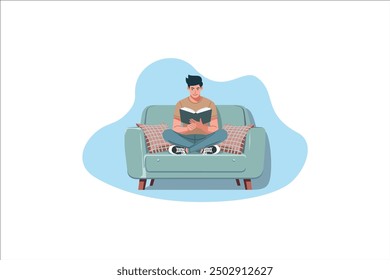 Person reading book, sitting in armchair in living room.