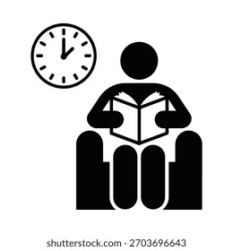 Person reading a book while waiting next to a clock