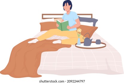 Person reading on bed semi flat color vector character. Posing figure. Full body person on white. Hygge lifestyle isolated modern cartoon style illustration for graphic design and animation