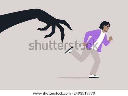 A person is running away from a large, clawed hand, which appears to be reaching out from a shadow