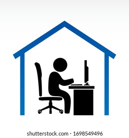 A Person Sitting on the Chair While Typing on the Keyboard and Looking at the Computer Working Safely from Home