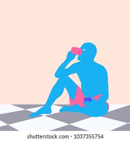 The person is sitting on the floor, holding a mug in his hand and drinking from it. In the other hand of the character is the phone.
