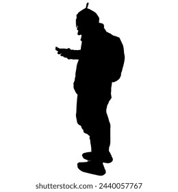 Person standing using cell phone