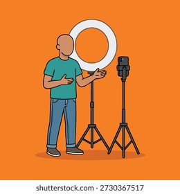 A person stands in front of a ring light and microphone, gesturing as if speaking to a camera.