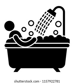 
A person is taking bubble bath in a bathtub with shower
