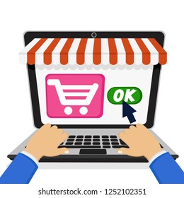 A person through a laptop makes a purchase in an online store.