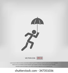 A person with an umbrella icon