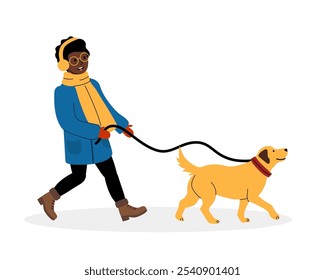 Person walking a golden retriever dog in a cozy winter outfit during a sunny day