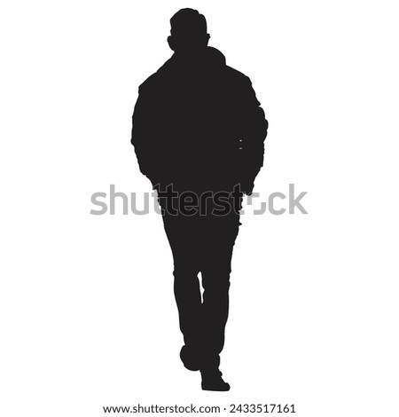 A person walking in silhouette
