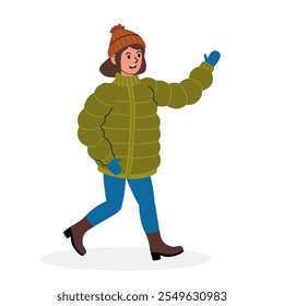 Person walking in a warm jacket and hat during a winter day