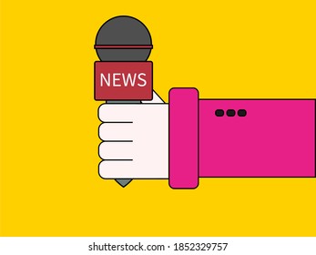 Person who is doing an interview and holds a microphone