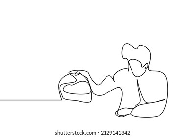 person whose arm is broken and tied after motorcycle accident sits and thinks