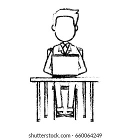 person working on computer sitting on a chair behind the office desk
