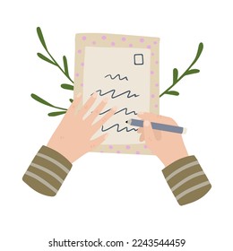 Person writes letter. Hand holding envelope
