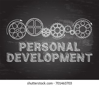 Personal development text with gear wheels hand drawn on blackboard background
