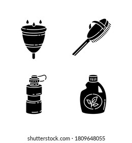 Personal eco products black glyph icons set on white space. Menstrual cup, natural bath brush, reusable water bottle and organic cleaning product silhouette symbols. Vector isolated illustrations