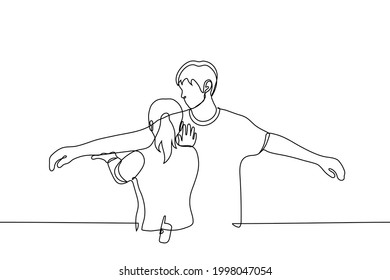 Personal inspection. security guard checks a man who stretched out his arms to the sides - one line drawing vector. concept through security at the airport, a man is being checked before boarding 