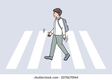 Personal safety and crosswalk concept. smiling boy pupil crossing road on crosswalk feeling confident and safe vector illustration 