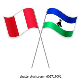 Peruvian and Basotho crossed flags. Peru combined with Lesotho isolated on white. Language learning, international business or travel concept.