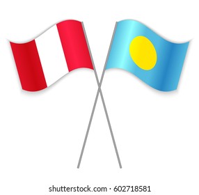 Peruvian and Palauan crossed flags. Peru combined with Palau isolated on white. Language learning, international business or travel concept.