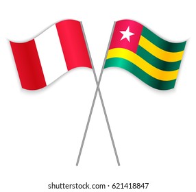 Peruvian and Togolese crossed flags. Peru combined with Togo isolated on white. Language learning, international business or travel concept.