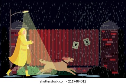 Pet care concept. A woman walks her dog despite bad weather. Rainy evening.