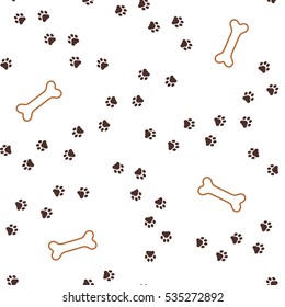 Pet dog theme seamless pattern with animal paw footprints paths and bones