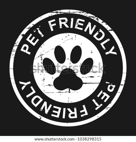 Pet friendly grunge stamp, white isolated on black background, vector illustration.