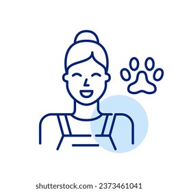 Pet groomer. Smiling kind girl in apron with paw symbol. Pixel perfect icon