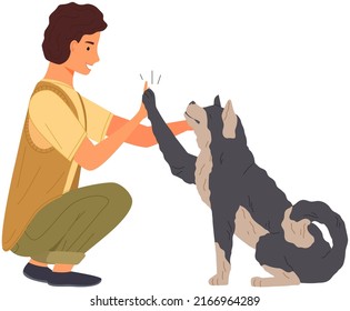 Pet owner plays with dog. Caring for animals, joint pastime with pets. Happy guy with puppy, domestic animal companion at home. Male character training doggy. Man spends time with dog and give five
