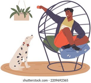 Pet owner plays with dog. Caring for animals, joint pastime with pets concept. Happy guy with puppy, domestic animal companion at home. Male character training doggy. Man spends time with dalmatian