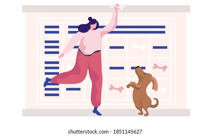 Pet owner young woman spend time with her dog, take care of domestic animal cheerful puppy. The girl have fun and active time, play with funny pooch, feeds the dog with a bone, is engaged in training