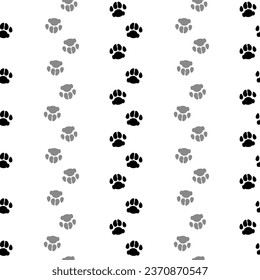 Pet paw black prints trail. Seamless border with domestic dog or cat cute footprints silhouette. Vector illustration isolated on white background.