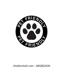 Pet paw or dog label. Footprint with pet friendly text. Vector on isolated white background. EPS 10